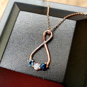 sapphire and diamond birthstone necklace custom created by the jeweler ryan