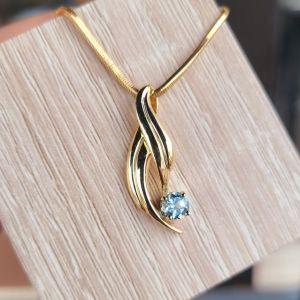 aquamarine birthstone gold necklace custom created by the jeweler ryan