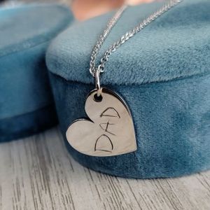 silver engraved heart necklace personalized for fathers day and created by the jeweler ryan