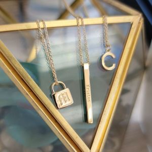 customized name, initial, and zodiac necklaces from the jeweler ryan