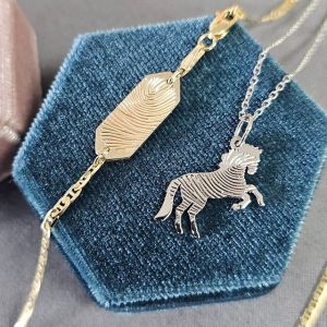 personalized fingerprint necklace and bracelet created by the jeweler ryan